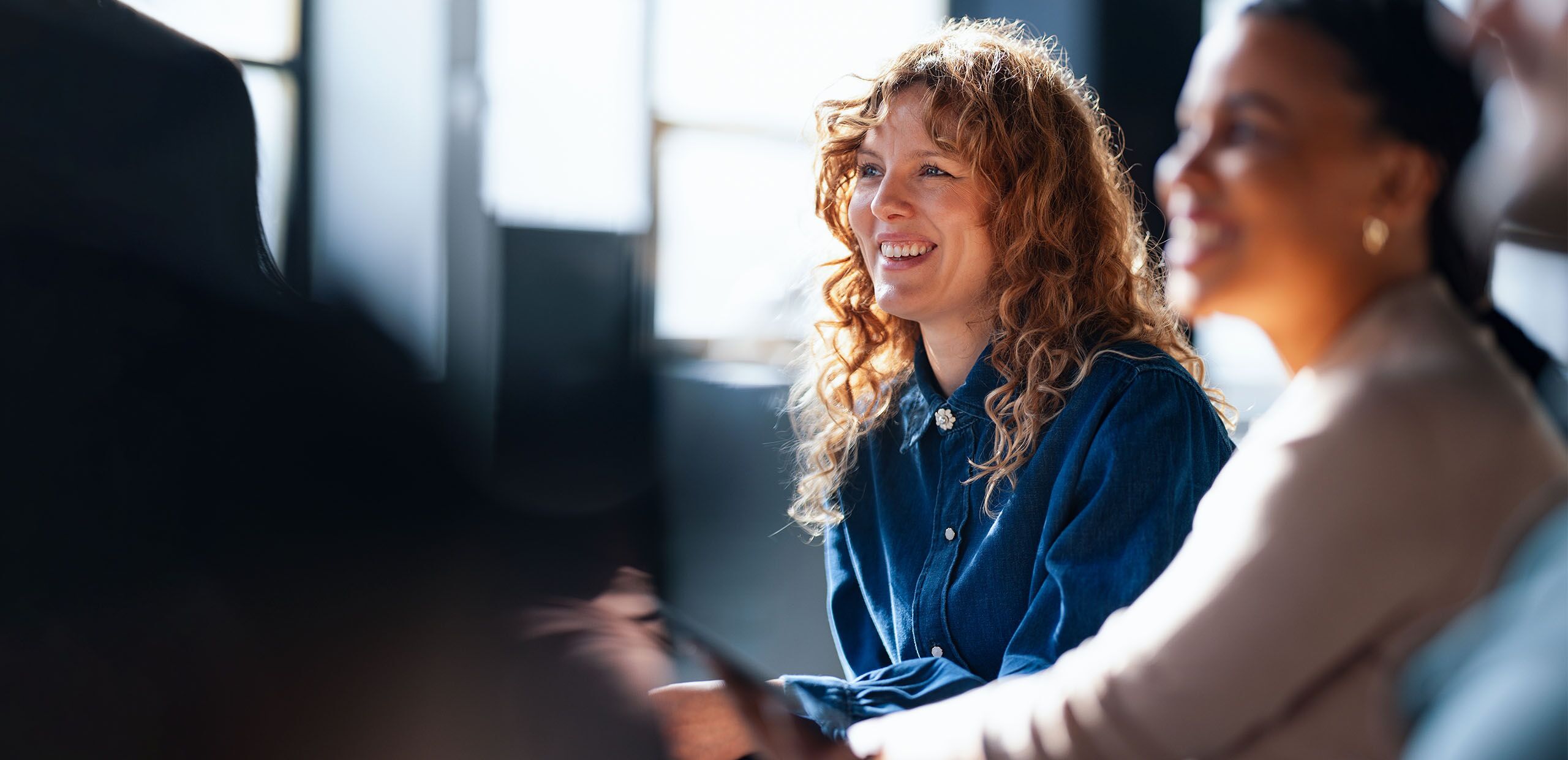 Smiling woman in a group